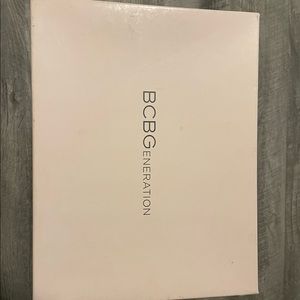 BCBGeneration Brand, knee high boots with heels, black & silver buckles, size6.5